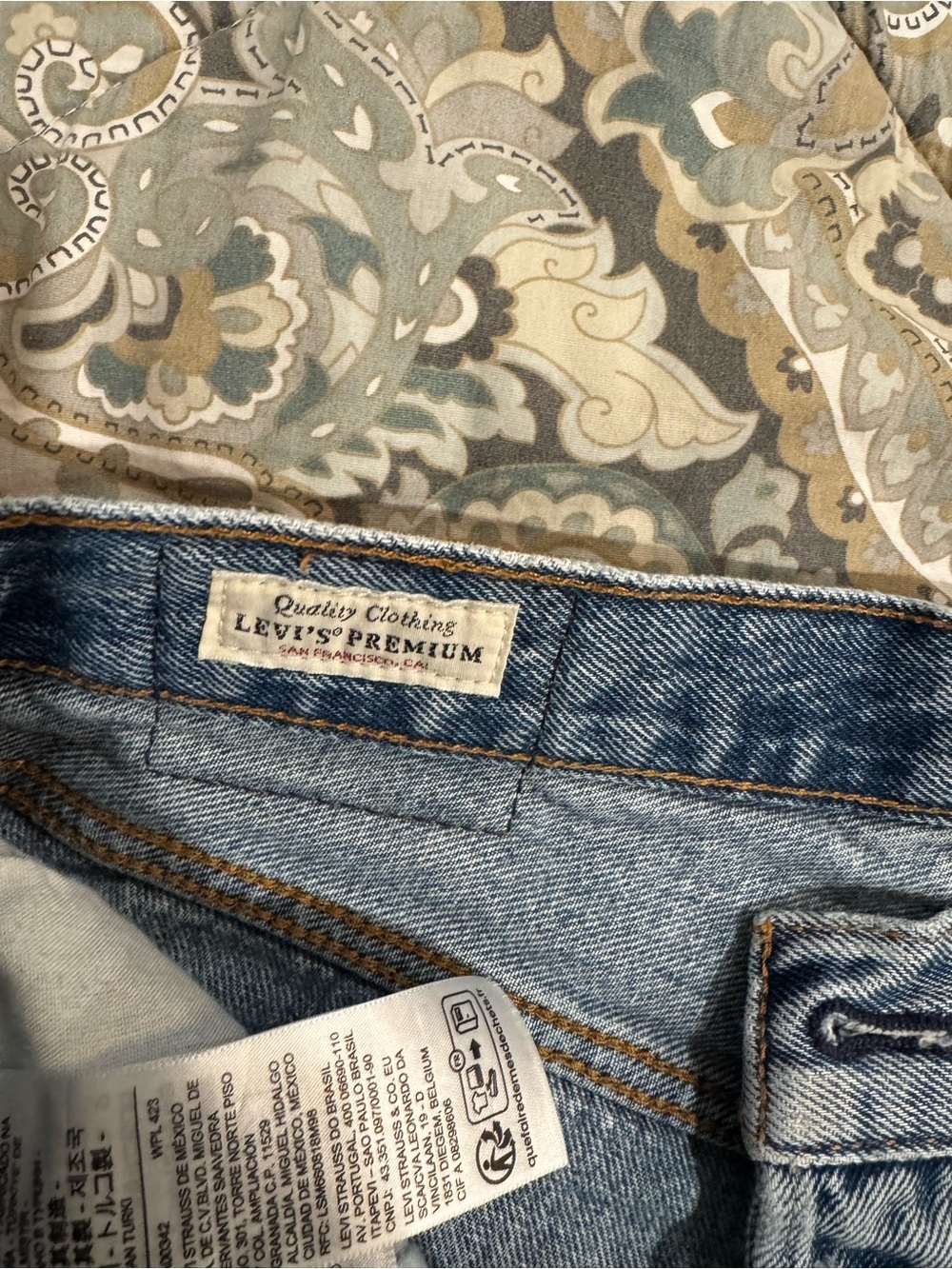 Levi's Distressed High-Rise Cutoff Denim Shorts - Light Blue Wash - Picture 4 of 5